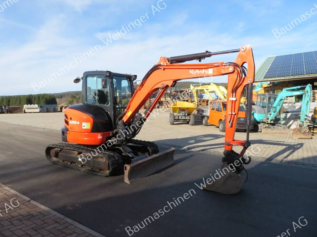 Kubota U 55-4 - Minikotró: 1 kép. Kubota U 55-4 - Minikotró: 1 kép.