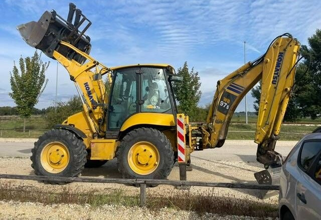 Komatsu WB 97 S - Kotrórakodó: 5 kép. Komatsu WB 97 S - Kotrórakodó: 5 kép.