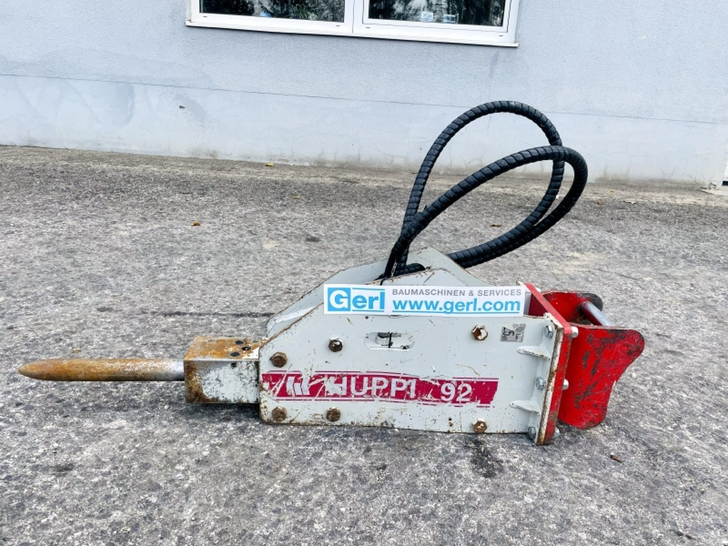 Huppi 92 (4093) - Hidraulikus törőfej: 2 kép. Huppi 92 (4093) - Hidraulikus törőfej: 2 kép.