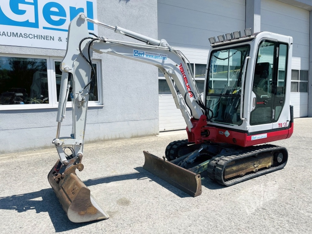 Takeuchi TB125 (4004) - Minikotró: 4 kép. Takeuchi TB125 (4004) - Minikotró: 4 kép.