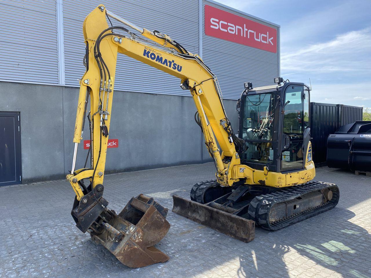 Komatsu PC55MR-5M0 - Minikotró: 1 kép. Komatsu PC55MR-5M0 - Minikotró: 1 kép.