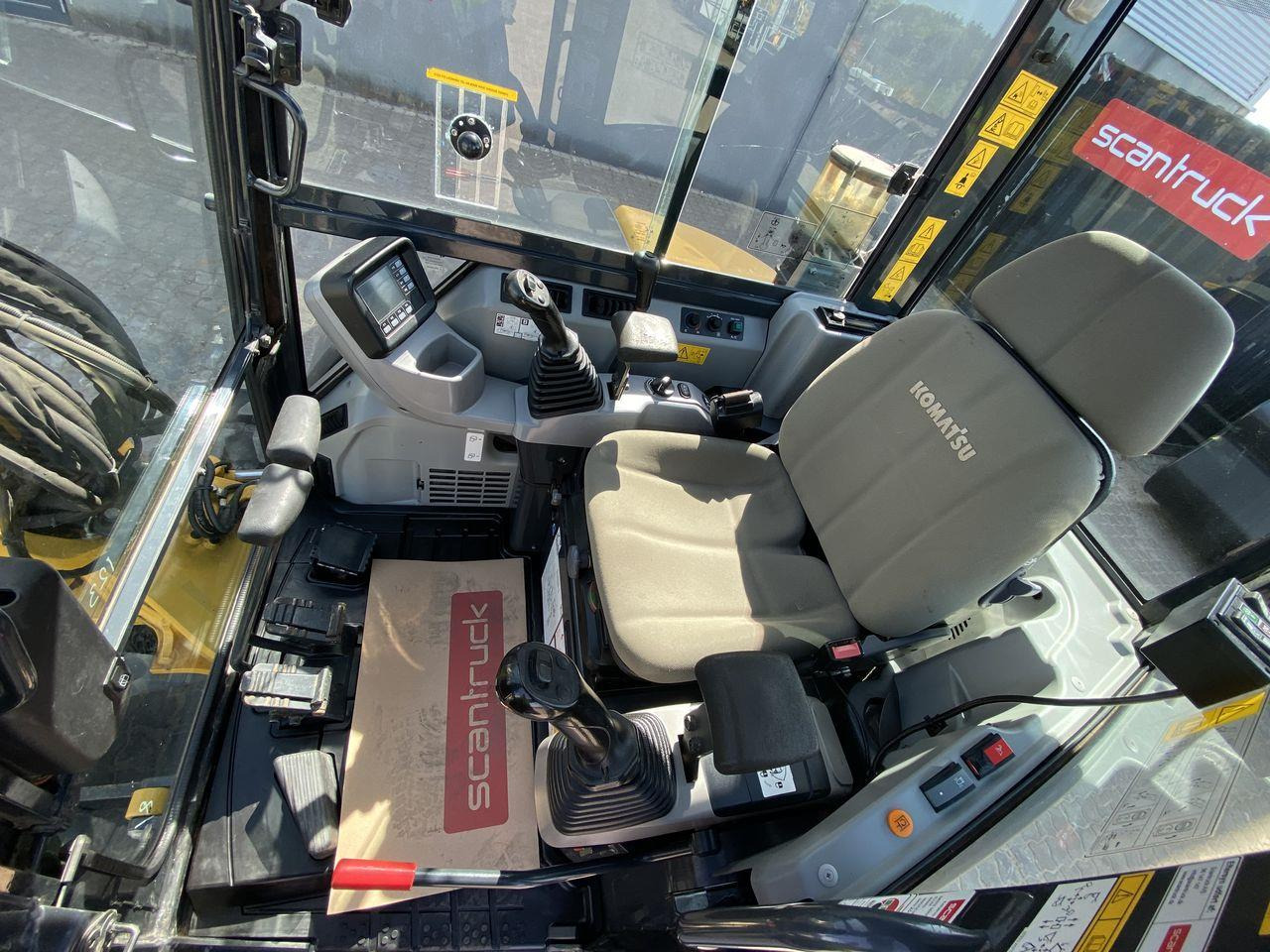 Komatsu PC55MR-5M0 - Minikotró: 3 kép. Komatsu PC55MR-5M0 - Minikotró: 3 kép.