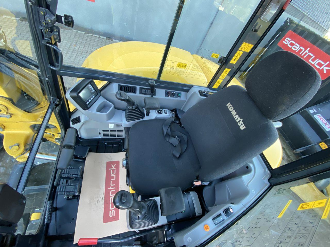 Komatsu PC80MR-5EO - Minikotró: 3 kép. Komatsu PC80MR-5EO - Minikotró: 3 kép.