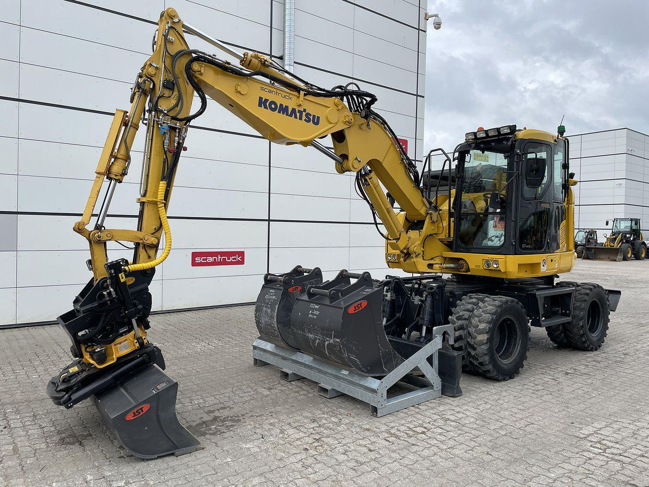 Komatsu PW118MR-11 - Minikotró: 1 kép. Komatsu PW118MR-11 - Minikotró: 1 kép.