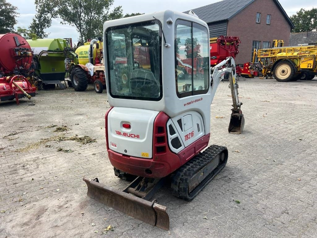 Takeuchi TB 216 - Minikotró: 4 kép. Takeuchi TB 216 - Minikotró: 4 kép.