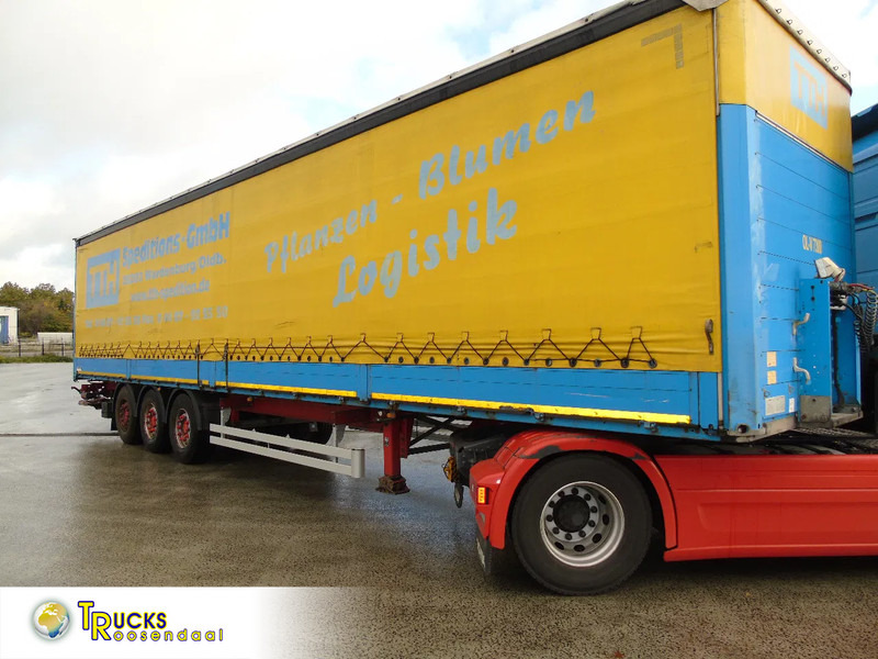 Schmitz Cargobull 3 AXLE SAF + DHOLLANDIA LOADLIFT + SLIDING ROOF - Ponyvás félpótkocsi: 1 kép. Schmitz Cargobull 3 AXLE SAF + DHOLLANDIA LOADLIFT + SLIDING ROOF - Ponyvás félpótkocsi: 1 kép.