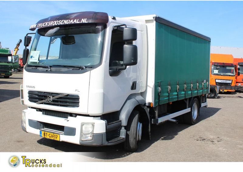Volvo FL 12 .240 + LIFT + MANUAL - Ponyvás teherautó: 1 kép. Volvo FL 12 .240 + LIFT + MANUAL - Ponyvás teherautó: 1 kép.