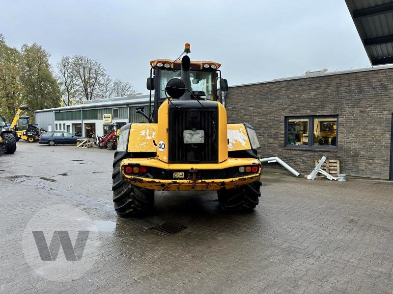 JCB 427 HT Agri - Gumikerekes homlokrakodó: 4 kép. JCB 427 HT Agri - Gumikerekes homlokrakodó: 4 kép.