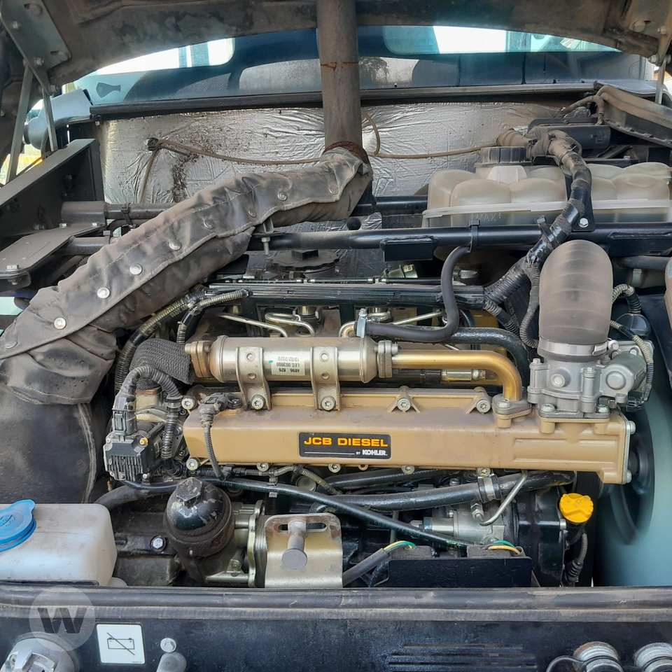 JCB TM 220 - Gumikerekes homlokrakodó: 4 kép. JCB TM 220 - Gumikerekes homlokrakodó: 4 kép.