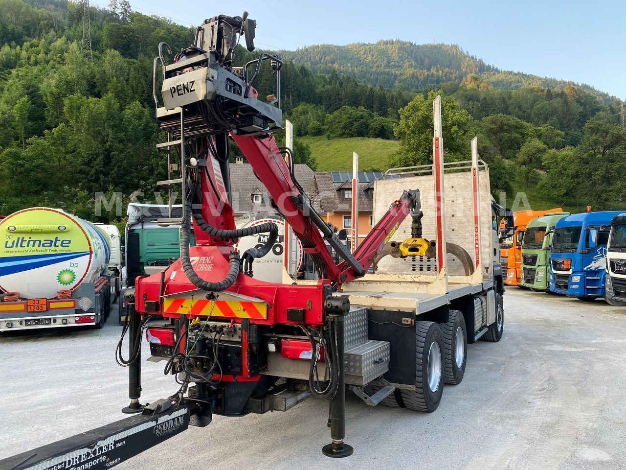 MAN 33.500 6X6 mit Kran PENZ 12Z - Rönkszállító teherautó, Darus autó: 3 kép. MAN 33.500 6X6 mit Kran PENZ 12Z - Rönkszállító teherautó, Darus autó: 3 kép.