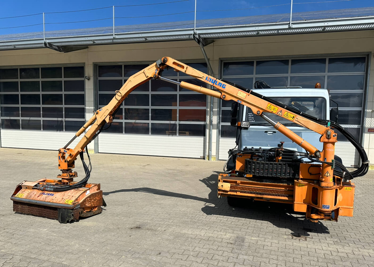 Unimog Frontauslegermähgerät Mulag FME600 - Rézsűkasza: 3 kép. Unimog Frontauslegermähgerät Mulag FME600 - Rézsűkasza: 3 kép.