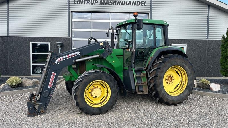 John Deere 6910 Auto Quad II-TLS Med frontlæsser - Traktor: 1 kép. John Deere 6910 Auto Quad II-TLS Med frontlæsser - Traktor: 1 kép.