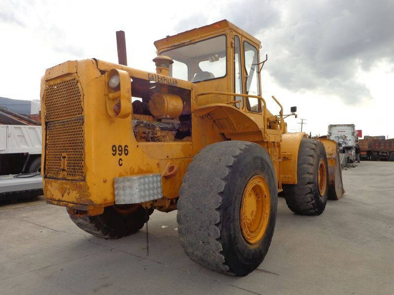 Caterpillar CAT 966C Wheeloader - Gumikerekes homlokrakodó: 2 kép. Caterpillar CAT 966C Wheeloader - Gumikerekes homlokrakodó: 2 kép.