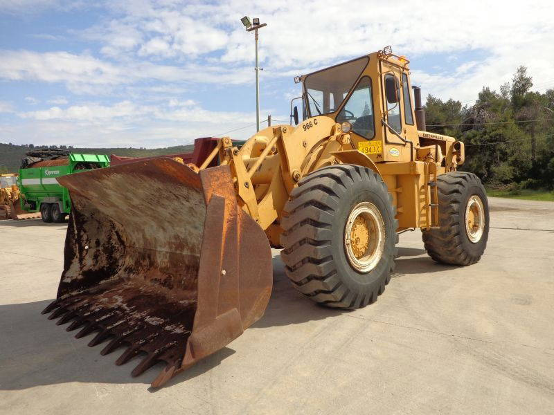 Caterpillar CAT 966C Wheeloader-Sold - Gumikerekes homlokrakodó: 3 kép. Caterpillar CAT 966C Wheeloader-Sold - Gumikerekes homlokrakodó: 3 kép.