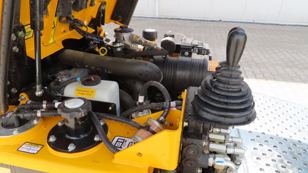 Minidömper JCB 1T-2 HT: 10 kép.