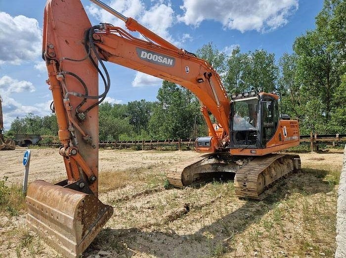 Doosan DX255 LC-3 - Kotrógép: 1 kép. Doosan DX255 LC-3 - Kotrógép: 1 kép.