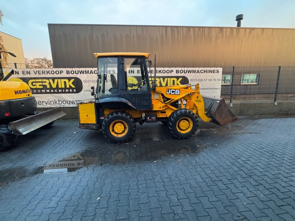 JCB 2 CX Airmaster - Gumikerekes homlokrakodó: 1 kép. JCB 2 CX Airmaster - Gumikerekes homlokrakodó: 1 kép.