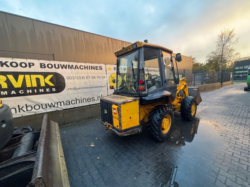 JCB 2 CX Airmaster - Gumikerekes homlokrakodó: 3 kép. JCB 2 CX Airmaster - Gumikerekes homlokrakodó: 3 kép.