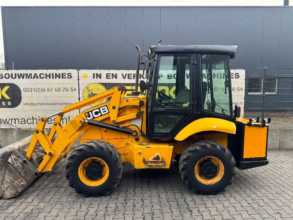JCB 2 CX Airmaster - Gumikerekes homlokrakodó: 2 kép. JCB 2 CX Airmaster - Gumikerekes homlokrakodó: 2 kép.