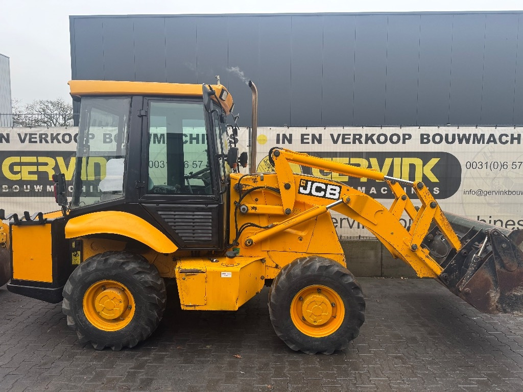 JCB 2 CX Airmaster - Gumikerekes homlokrakodó: 1 kép. JCB 2 CX Airmaster - Gumikerekes homlokrakodó: 1 kép.