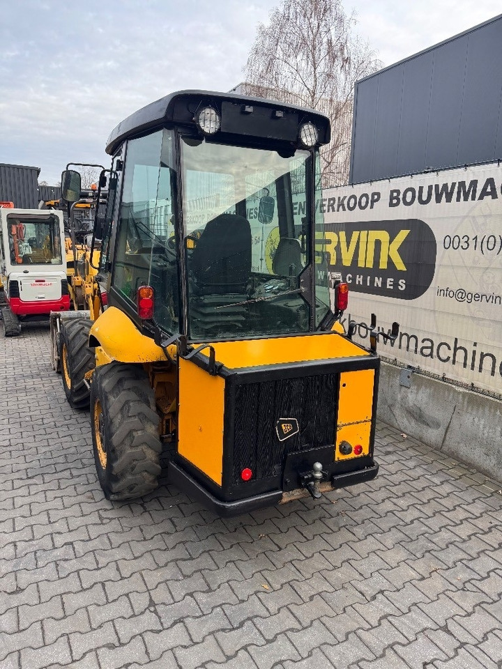 JCB 2 CX Airmaster - Gumikerekes homlokrakodó: 4 kép. JCB 2 CX Airmaster - Gumikerekes homlokrakodó: 4 kép.