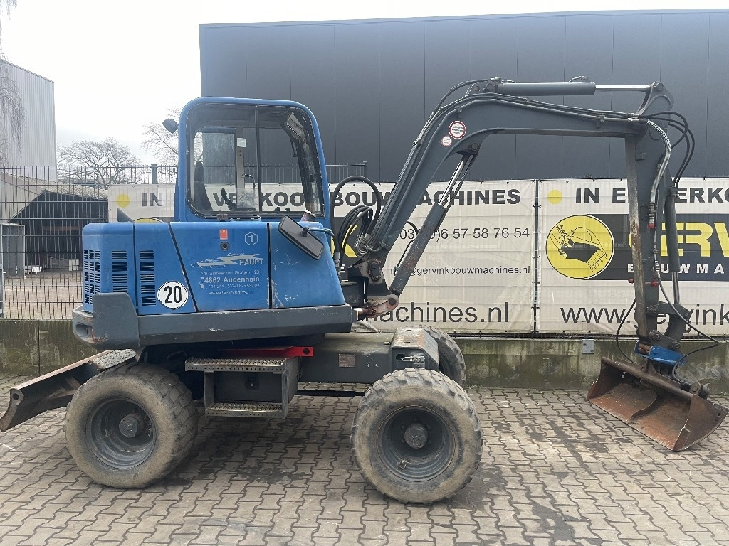 Peljop EW 256  - Gumikerekes kotró: 3 kép. Peljop EW 256  - Gumikerekes kotró: 3 kép.