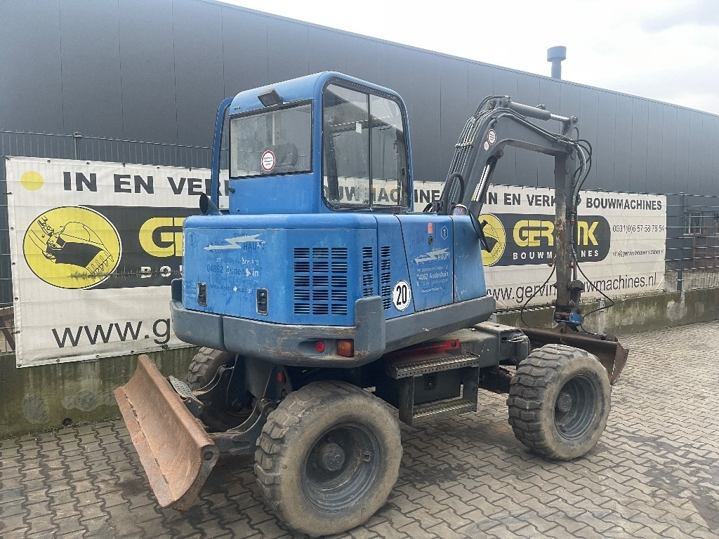 Peljop EW 256  - Gumikerekes kotró: 1 kép. Peljop EW 256  - Gumikerekes kotró: 1 kép.