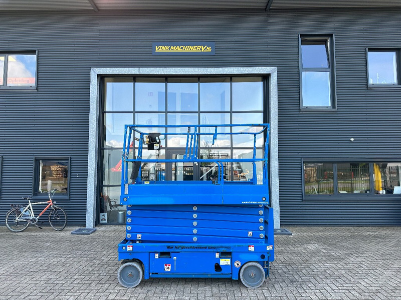 Haulotte Compact 14 - Ollós emelő: 1 kép. Haulotte Compact 14 - Ollós emelő: 1 kép.