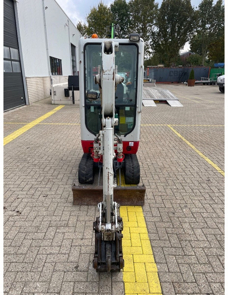 Takeuchi TB 216 - Minikotró: 4 kép. Takeuchi TB 216 - Minikotró: 4 kép.