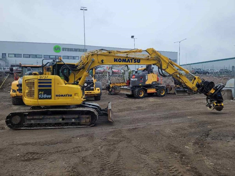 Komatsu PC 138 US-11 - Lánctalpas kotró: 2 kép. Komatsu PC 138 US-11 - Lánctalpas kotró: 2 kép.