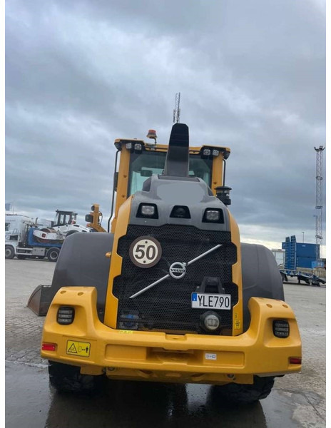 Volvo L 60 H - Gumikerekes homlokrakodó: 4 kép. Volvo L 60 H - Gumikerekes homlokrakodó: 4 kép.