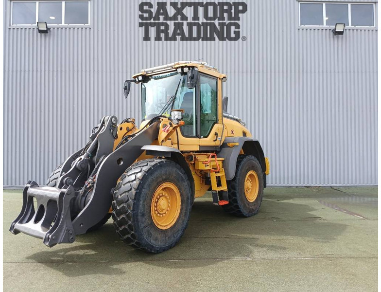 Volvo L70 H, Hjullastare - Gumikerekes homlokrakodó: 1 kép. Volvo L70 H, Hjullastare - Gumikerekes homlokrakodó: 1 kép.