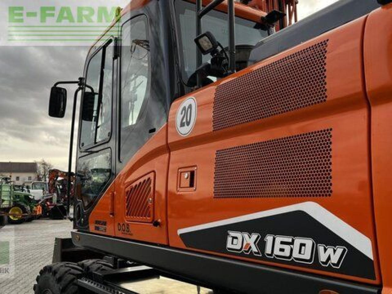 Doosan dx 160w-7 - Gumikerekes kotró: 4 kép. Doosan dx 160w-7 - Gumikerekes kotró: 4 kép.