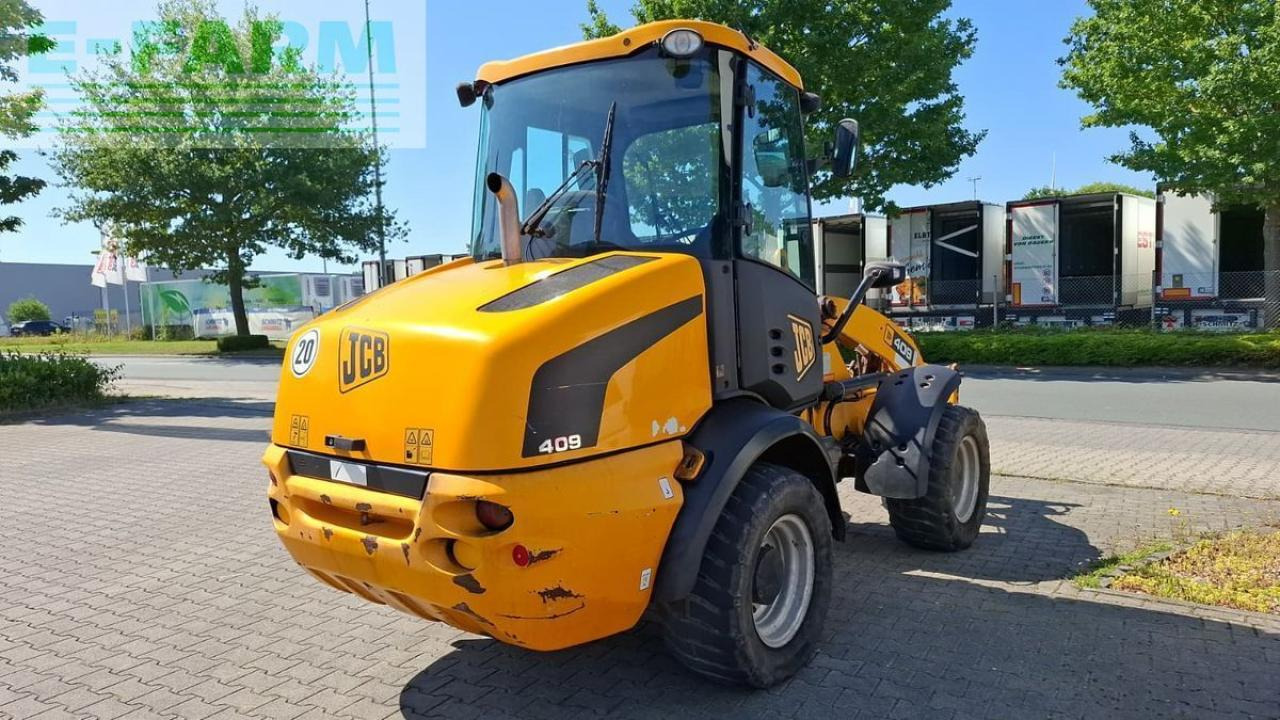 JCB 409 - Minikotró: 5 kép. JCB 409 - Minikotró: 5 kép.