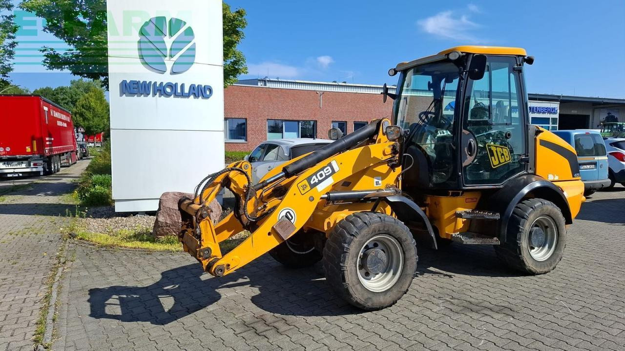 JCB 409 - Minikotró: 2 kép. JCB 409 - Minikotró: 2 kép.