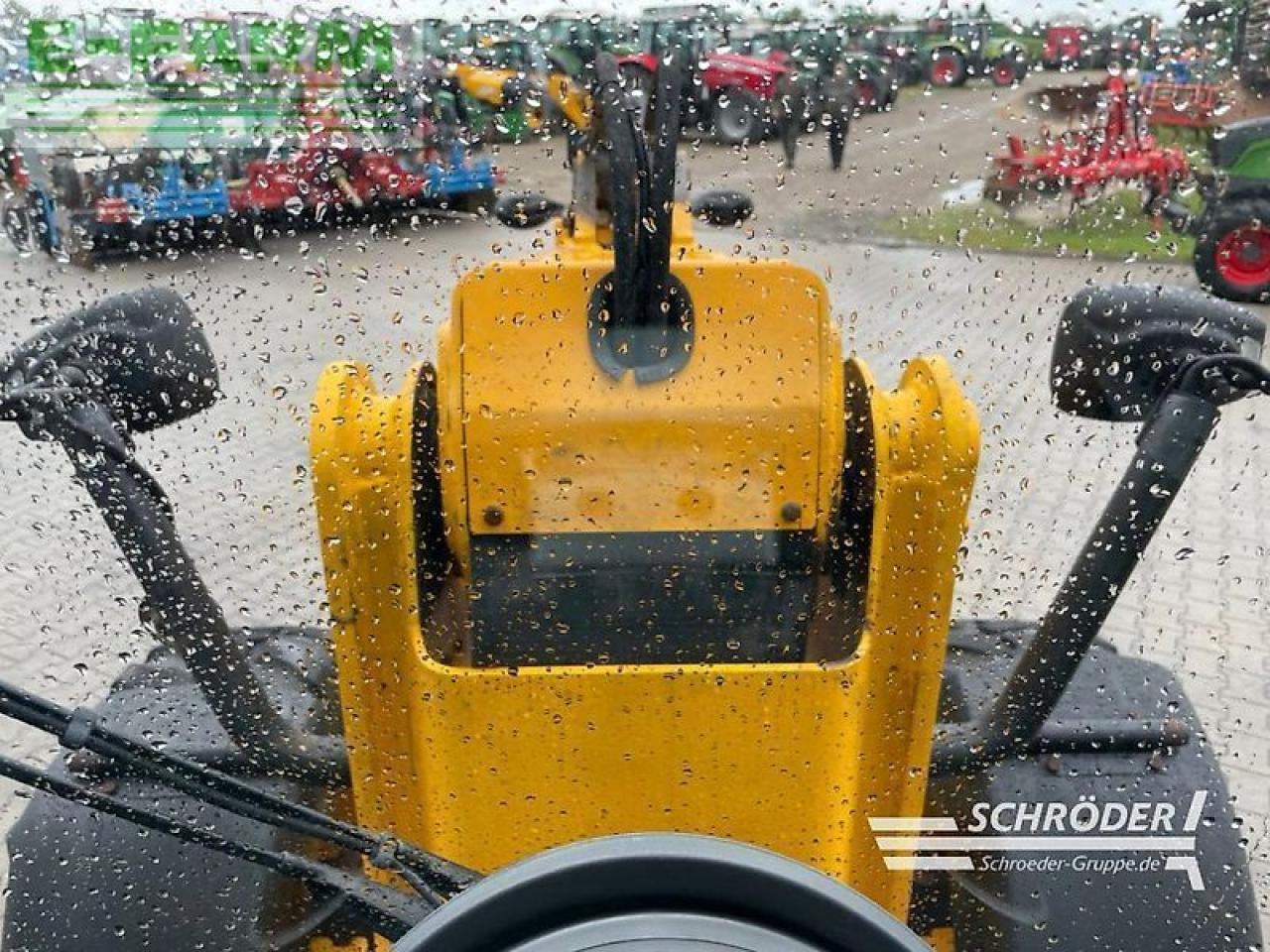 Gumikerekes homlokrakodó JCB tm 180 agri: 15 kép.