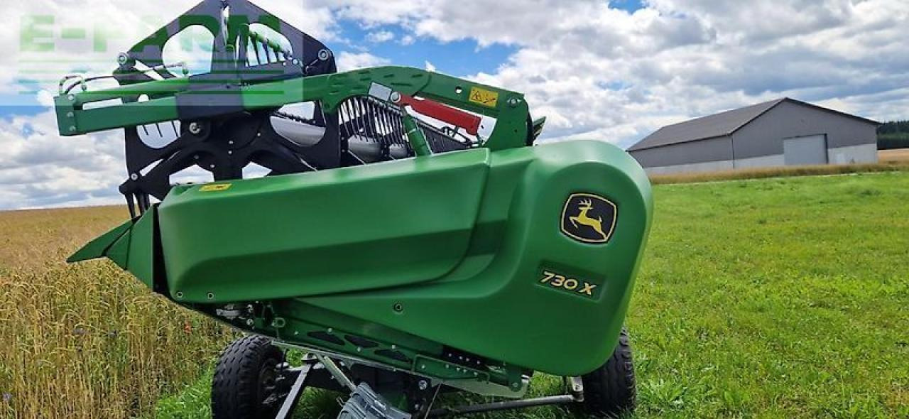 Kombájn John Deere t670i hm: 9 kép.