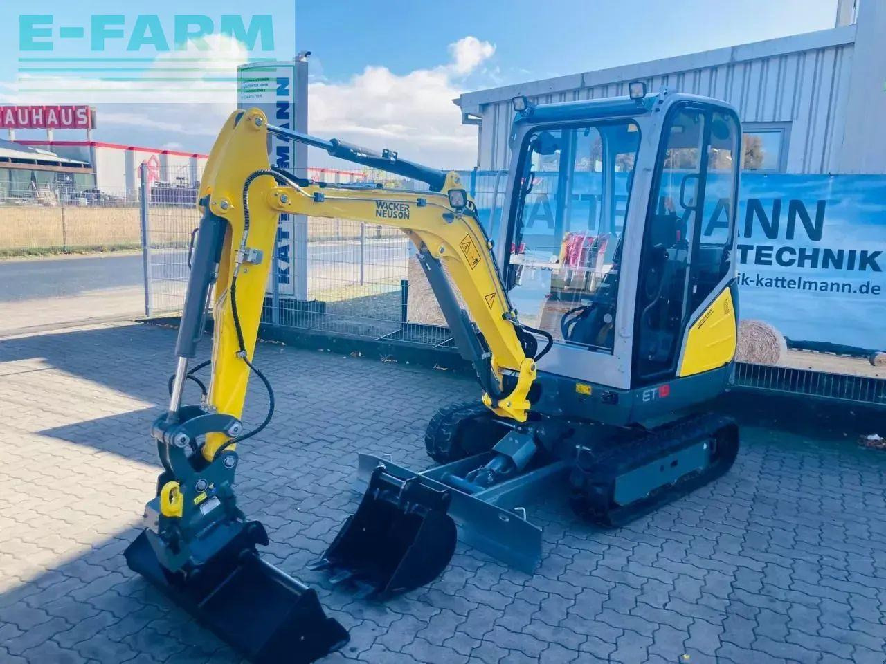 Neuson et 18 mit powertilt - Minikotró: 1 kép. Neuson et 18 mit powertilt - Minikotró: 1 kép.