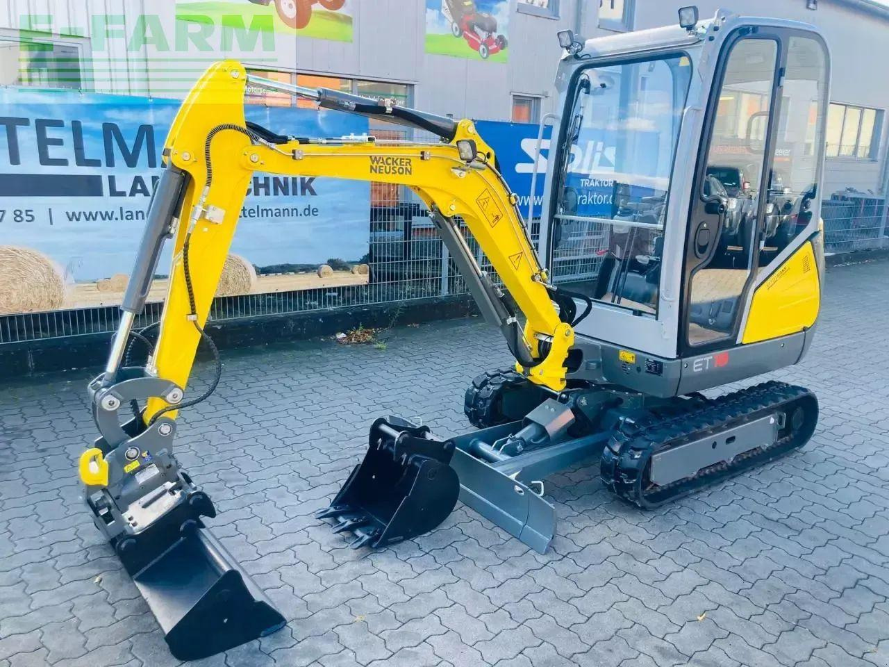 Neuson et 18 mit powertilt - Minikotró: 2 kép. Neuson et 18 mit powertilt - Minikotró: 2 kép.