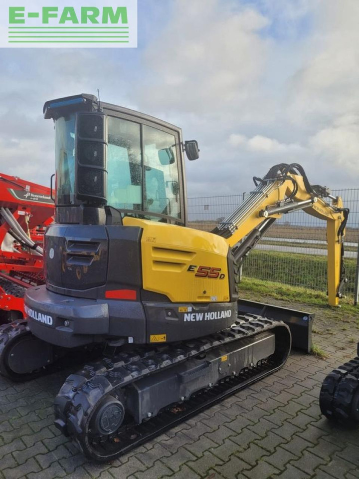 New Holland e55d - Minikotró: 5 kép. New Holland e55d - Minikotró: 5 kép.