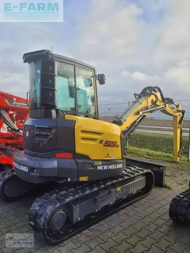 New Holland e55d - Minikotró: 5 kép. New Holland e55d - Minikotró: 5 kép.