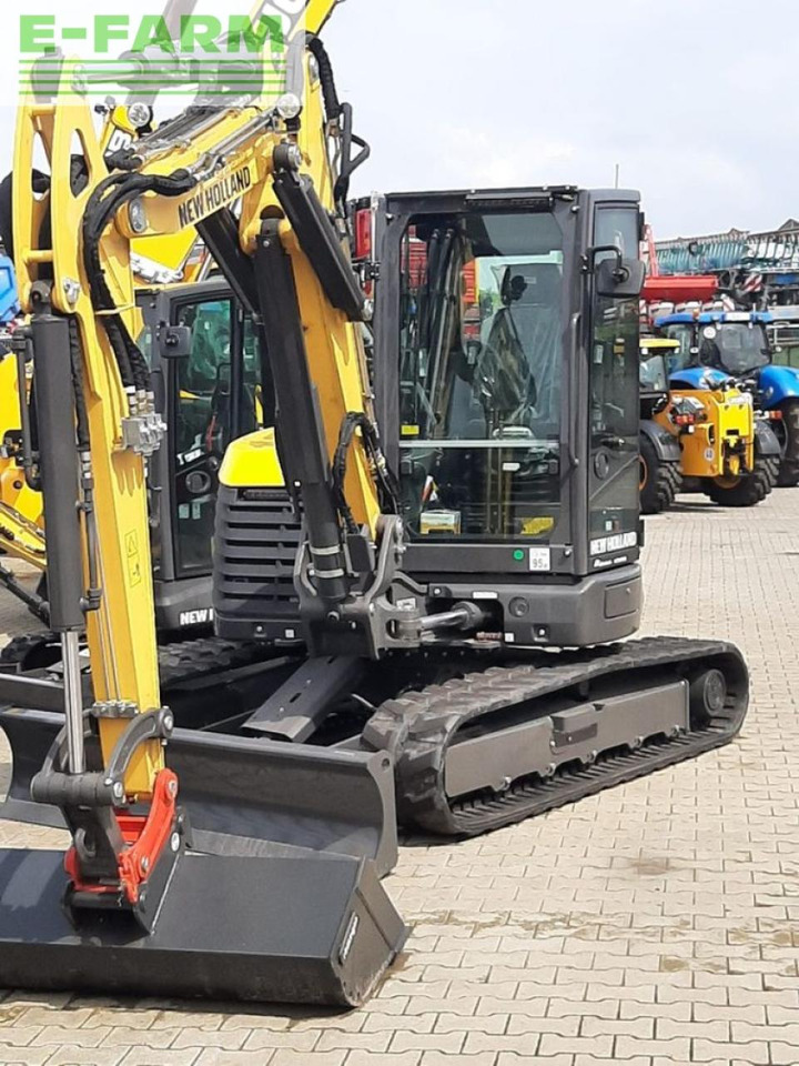 New Holland e65d - Minikotró: 5 kép. New Holland e65d - Minikotró: 5 kép.