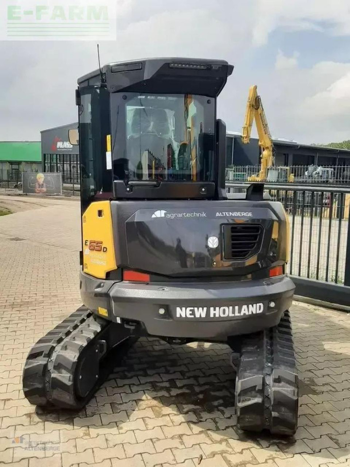 New Holland e65d - Minikotró: 3 kép. New Holland e65d - Minikotró: 3 kép.