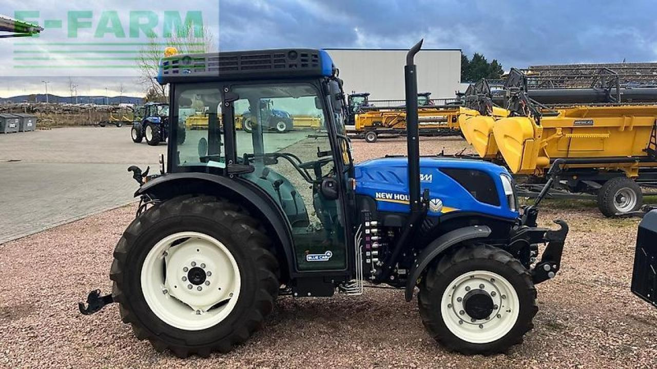 New Holland t 4.100 f schmalspur obstbau weinbau F - Traktor: 2 kép. New Holland t 4.100 f schmalspur obstbau weinbau F - Traktor: 2 kép.