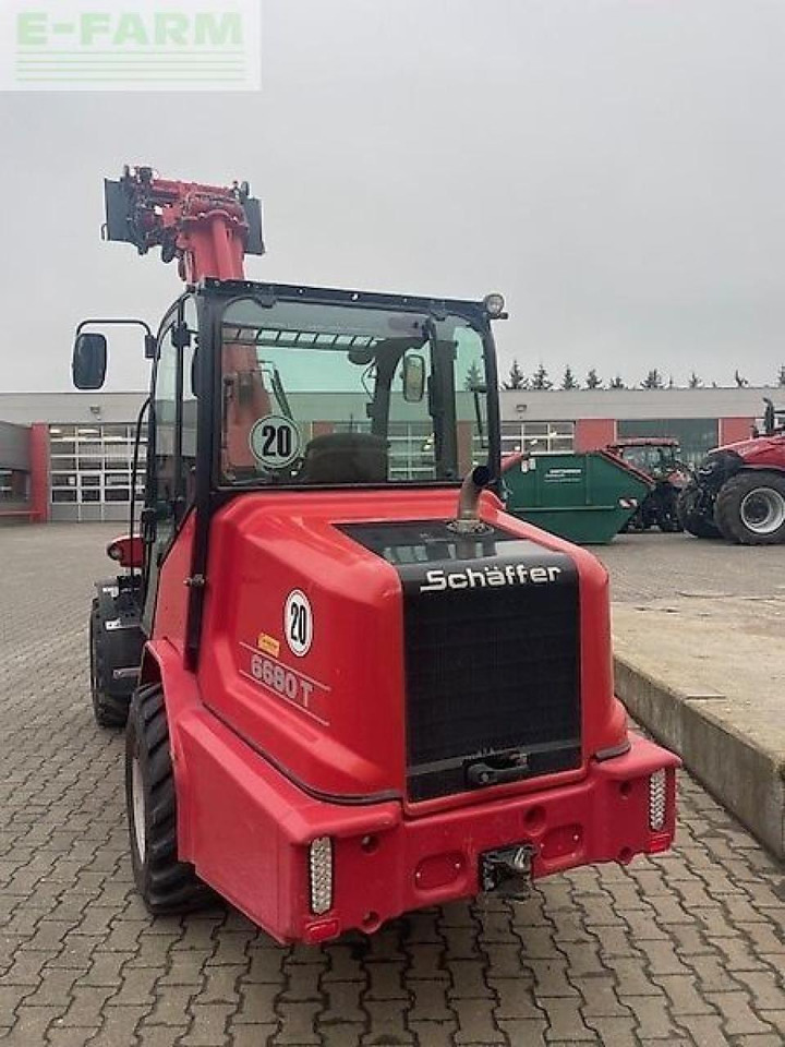 Schäffer 6680 t - Gumikerekes homlokrakodó: 2 kép. Schäffer 6680 t - Gumikerekes homlokrakodó: 2 kép.