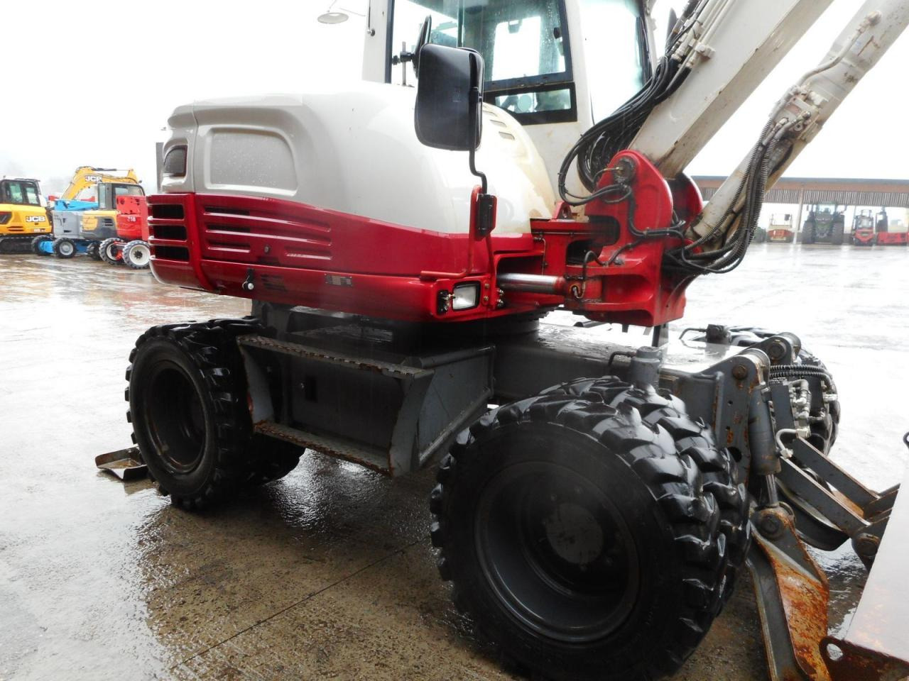 Gumikerekes kotró Takeuchi tb295w mit vollausstattung u. 3 löffel ( zentra: 13 kép.