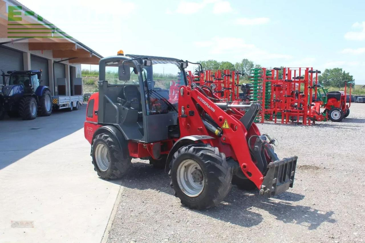 Weidemann 2070 cx 50 - Gumikerekes homlokrakodó: 5 kép. Weidemann 2070 cx 50 - Gumikerekes homlokrakodó: 5 kép.
