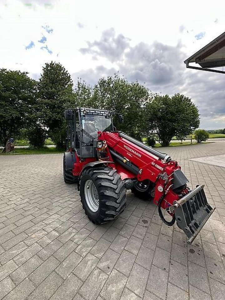 Weidemann teleskopradlader 5080t lader - Gumikerekes homlokrakodó: 5 kép. Weidemann teleskopradlader 5080t lader - Gumikerekes homlokrakodó: 5 kép.