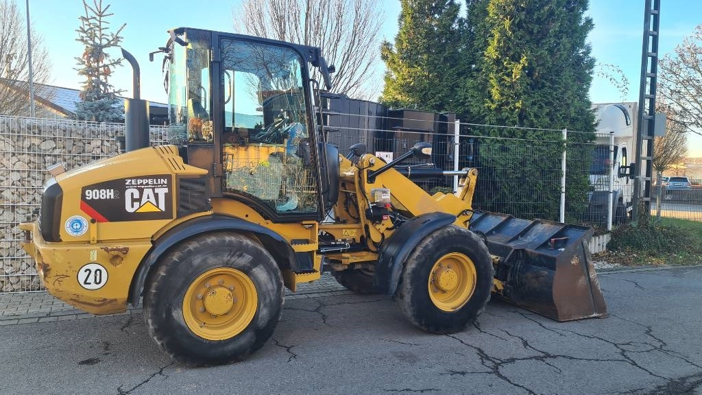 CAT 908 H2 hydr. Schnellwechsler 3. Steuerkreis Allrad - Gumikerekes homlokrakodó: 5 kép. CAT 908 H2 hydr. Schnellwechsler 3. Steuerkreis Allrad - Gumikerekes homlokrakodó: 5 kép.