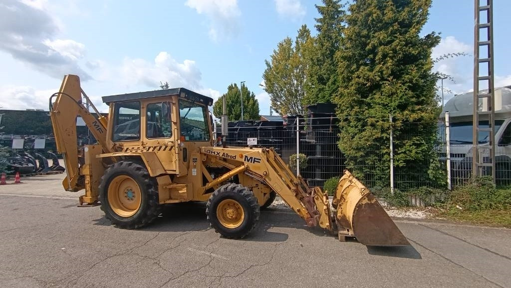 Massey Ferguson 50 HX, Allrad (4x4), Schaufel, Palettengabel, SW - Kotrórakodó: 4 kép. Massey Ferguson 50 HX, Allrad (4x4), Schaufel, Palettengabel, SW - Kotrórakodó: 4 kép.